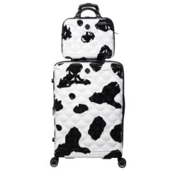 IT Luggage Indulging - 4pc Set (Moo Cow Print) -Luggage World Shop 33198 UK16 3039A08 16 3039A15Moocowblack whiterepeatprintSSFrontpanel25in